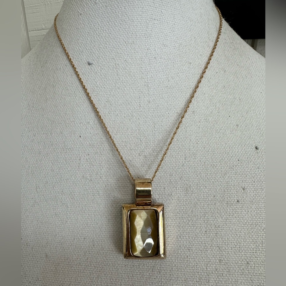 Goldtone chain necklace with three pendants